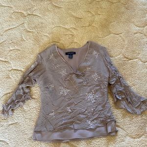 Silkland women’s size small color tan blouse with flower details